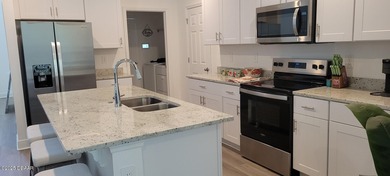 Brand new energy efficient home ready for a buyer NOW.  Modern on LPGA International Golf Course in Florida - for sale on GolfHomes.com, golf home, golf lot