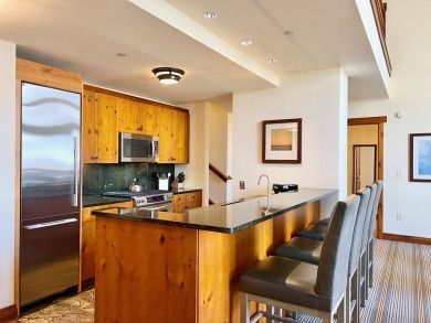 The Penthouses at the Lodge at Spruce Peak provides a mountain on Stowe Mountain Club in Vermont - for sale on GolfHomes.com, golf home, golf lot