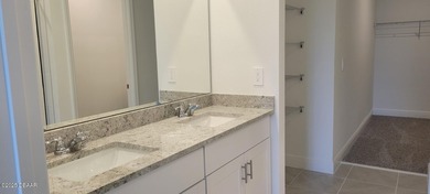 Brand new energy efficient home ready for a buyer NOW.  Modern on LPGA International Golf Course in Florida - for sale on GolfHomes.com, golf home, golf lot