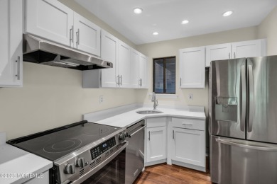 Move in ready 2 bedroom 2 bath upper level unit with views of on Shadow Lake Village in New Jersey - for sale on GolfHomes.com, golf home, golf lot