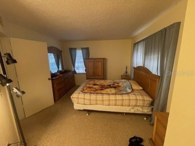 2 Bedroom and 2 Bathroom upstairs CONDO, Nestled within a on Country Club At Silver Springs Shores in Florida - for sale on GolfHomes.com, golf home, golf lot