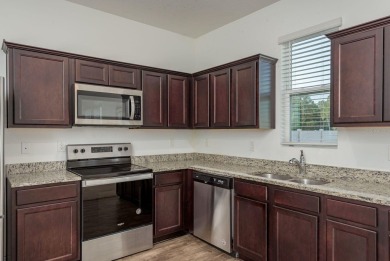 Built in 2021, this 3 bedroom, 2.5 bathroom home in the highly on The Links of Lake Bernadette in Florida - for sale on GolfHomes.com, golf home, golf lot