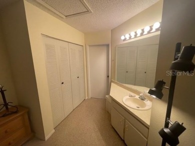 2 Bedroom and 2 Bathroom upstairs CONDO, Nestled within a on Country Club At Silver Springs Shores in Florida - for sale on GolfHomes.com, golf home, golf lot