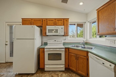 This warm and welcoming home is located in a  highly sought on Prescott Golf and Country Club in Arizona - for sale on GolfHomes.com, golf home, golf lot