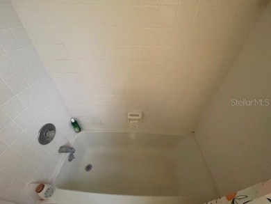 2 Bedroom and 2 Bathroom upstairs CONDO, Nestled within a on Country Club At Silver Springs Shores in Florida - for sale on GolfHomes.com, golf home, golf lot