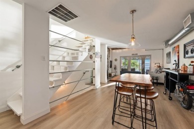 Stunning WATERFRONT townhome in a Mediterranean Style, gated on Lakeside Village Golf Course in Texas - for sale on GolfHomes.com, golf home, golf lot
