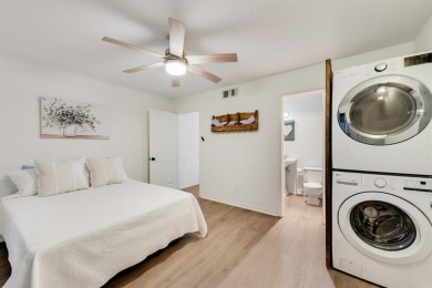 Stunning WATERFRONT townhome in a Mediterranean Style, gated on Lakeside Village Golf Course in Texas - for sale on GolfHomes.com, golf home, golf lot