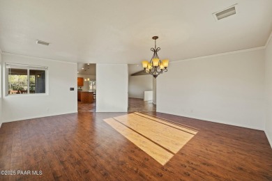 This warm and welcoming home is located in a  highly sought on Prescott Golf and Country Club in Arizona - for sale on GolfHomes.com, golf home, golf lot