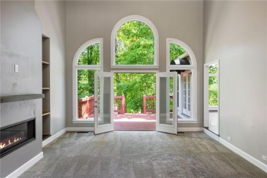 Fabulous retreat located in the heart of Towne Lake that offers on Canongate At Eagle Watch Golf Club in Georgia - for sale on GolfHomes.com, golf home, golf lot