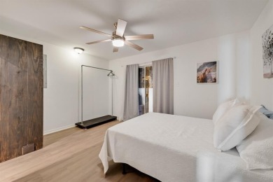 Stunning WATERFRONT townhome in a Mediterranean Style, gated on Lakeside Village Golf Course in Texas - for sale on GolfHomes.com, golf home, golf lot
