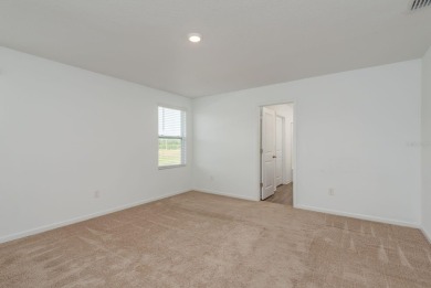 Built in 2021, this 3 bedroom, 2.5 bathroom home in the highly on The Links of Lake Bernadette in Florida - for sale on GolfHomes.com, golf home, golf lot