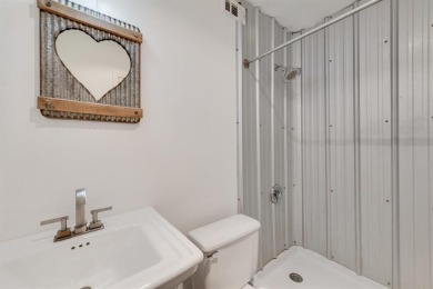 Stunning WATERFRONT townhome in a Mediterranean Style, gated on Lakeside Village Golf Course in Texas - for sale on GolfHomes.com, golf home, golf lot