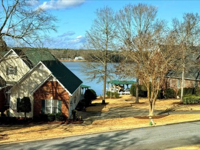 This modern lakeview home in Stoney Point, Greenwood, SC on The Links At Stoney Point in South Carolina - for sale on GolfHomes.com, golf home, golf lot