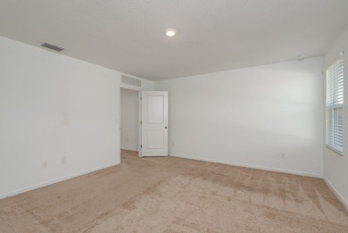 Built in 2021, this 3 bedroom, 2.5 bathroom home in the highly on The Links of Lake Bernadette in Florida - for sale on GolfHomes.com, golf home, golf lot