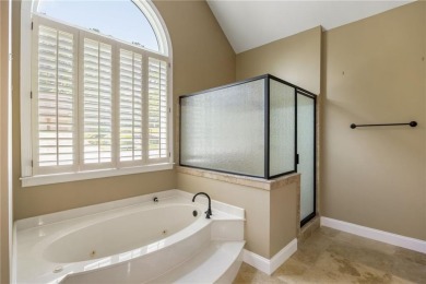 Fabulous retreat located in the heart of Towne Lake that offers on Canongate At Eagle Watch Golf Club in Georgia - for sale on GolfHomes.com, golf home, golf lot
