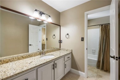 Fabulous retreat located in the heart of Towne Lake that offers on Canongate At Eagle Watch Golf Club in Georgia - for sale on GolfHomes.com, golf home, golf lot