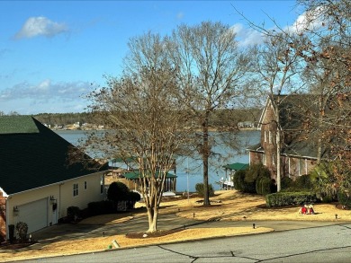 This modern lakeview home in Stoney Point, Greenwood, SC on The Links At Stoney Point in South Carolina - for sale on GolfHomes.com, golf home, golf lot