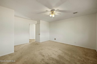 This warm and welcoming home is located in a  highly sought on Prescott Golf and Country Club in Arizona - for sale on GolfHomes.com, golf home, golf lot