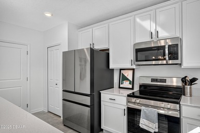 Welcome to this stunning 4-bedroom, 2.5-bath single-family home on LPGA International Golf Course in Florida - for sale on GolfHomes.com, golf home, golf lot