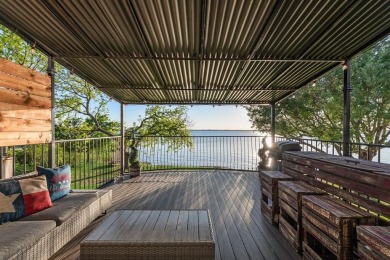 Stunning WATERFRONT townhome in a Mediterranean Style, gated on Lakeside Village Golf Course in Texas - for sale on GolfHomes.com, golf home, golf lot