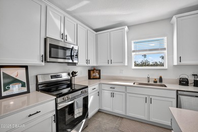 Welcome to this stunning 4-bedroom, 2.5-bath single-family home on LPGA International Golf Course in Florida - for sale on GolfHomes.com, golf home, golf lot