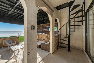Stunning WATERFRONT townhome in a Mediterranean Style, gated on Lakeside Village Golf Course in Texas - for sale on GolfHomes.com, golf home, golf lot