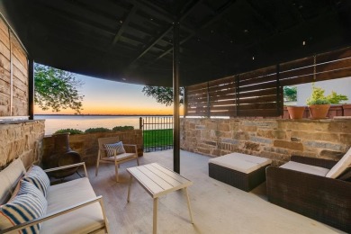 Stunning WATERFRONT townhome in a Mediterranean Style, gated on Lakeside Village Golf Course in Texas - for sale on GolfHomes.com, golf home, golf lot