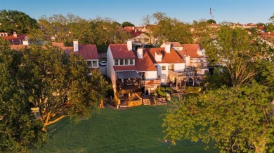 Stunning WATERFRONT townhome in a Mediterranean Style, gated on Lakeside Village Golf Course in Texas - for sale on GolfHomes.com, golf home, golf lot