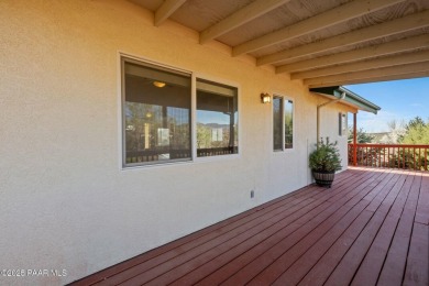 This warm and welcoming home is located in a  highly sought on Prescott Golf and Country Club in Arizona - for sale on GolfHomes.com, golf home, golf lot
