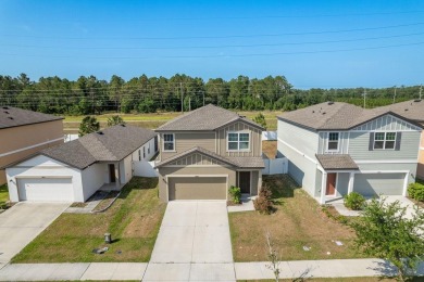 Built in 2021, this 3 bedroom, 2.5 bathroom home in the highly on The Links of Lake Bernadette in Florida - for sale on GolfHomes.com, golf home, golf lot
