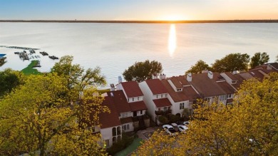 Stunning WATERFRONT townhome in a Mediterranean Style, gated on Lakeside Village Golf Course in Texas - for sale on GolfHomes.com, golf home, golf lot