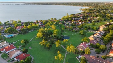 Stunning WATERFRONT townhome in a Mediterranean Style, gated on Lakeside Village Golf Course in Texas - for sale on GolfHomes.com, golf home, golf lot