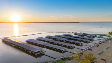 Stunning WATERFRONT townhome in a Mediterranean Style, gated on Lakeside Village Golf Course in Texas - for sale on GolfHomes.com, golf home, golf lot