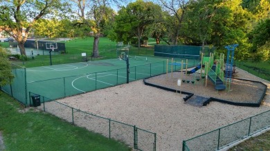 Stunning WATERFRONT townhome in a Mediterranean Style, gated on Lakeside Village Golf Course in Texas - for sale on GolfHomes.com, golf home, golf lot