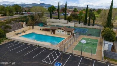 This warm and welcoming home is located in a  highly sought on Prescott Golf and Country Club in Arizona - for sale on GolfHomes.com, golf home, golf lot