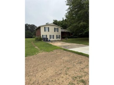 Due to unforeseen circumstances sellers must let this home go - on Searcy Country Club in Arkansas - for sale on GolfHomes.com, golf home, golf lot