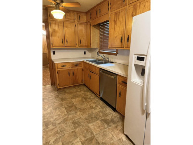 Due to unforeseen circumstances sellers must let this home go - on Searcy Country Club in Arkansas - for sale on GolfHomes.com, golf home, golf lot