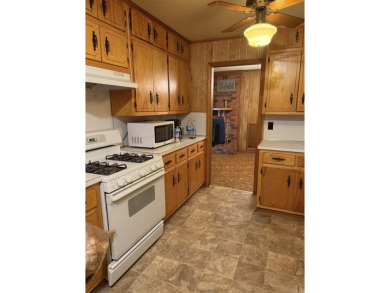 Due to unforeseen circumstances sellers must let this home go - on Searcy Country Club in Arkansas - for sale on GolfHomes.com, golf home, golf lot