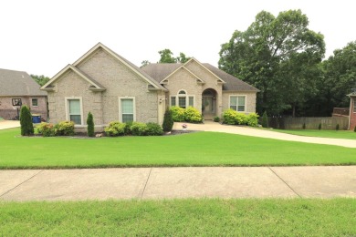 Discover this stunning brick home nestled in a serene golf on Greystone Country Club in Arkansas - for sale on GolfHomes.com, golf home, golf lot