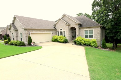 Discover this stunning brick home nestled in a serene golf on Greystone Country Club in Arkansas - for sale on GolfHomes.com, golf home, golf lot