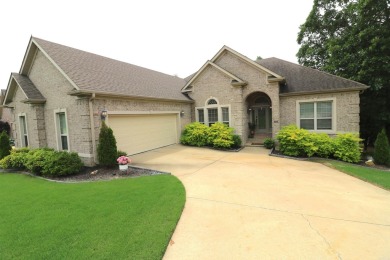 Discover this stunning brick home nestled in a serene golf on Greystone Country Club in Arkansas - for sale on GolfHomes.com, golf home, golf lot