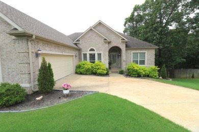 Discover this stunning brick home nestled in a serene golf on Greystone Country Club in Arkansas - for sale on GolfHomes.com, golf home, golf lot