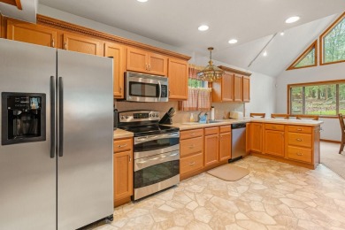 Discover the perfect mountain retreat at this contemporary home on Split Rock Resort and Country Club in Pennsylvania - for sale on GolfHomes.com, golf home, golf lot