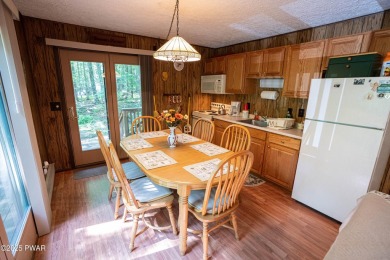 Welcome to this classic Pocono lake chalet, nestled in the heart on The Hideout Golf in Pennsylvania - for sale on GolfHomes.com, golf home, golf lot