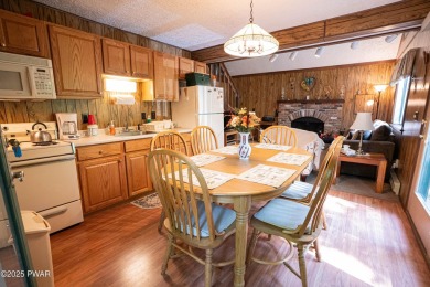 Welcome to this classic Pocono lake chalet, nestled in the heart on The Hideout Golf in Pennsylvania - for sale on GolfHomes.com, golf home, golf lot