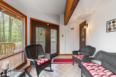 Discover the perfect mountain retreat at this contemporary home on Split Rock Resort and Country Club in Pennsylvania - for sale on GolfHomes.com, golf home, golf lot