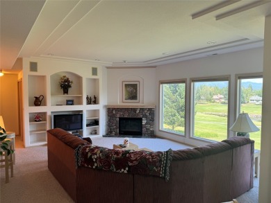 Enjoy expansive views of the mountains over the golf course from on Whitefish Lake Golf Club in Montana - for sale on GolfHomes.com, golf home, golf lot