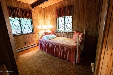 Welcome to this classic Pocono lake chalet, nestled in the heart on The Hideout Golf in Pennsylvania - for sale on GolfHomes.com, golf home, golf lot