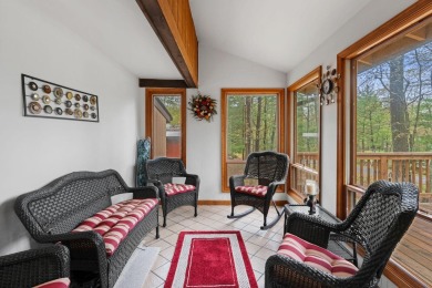 Discover the perfect mountain retreat at this contemporary home on Split Rock Resort and Country Club in Pennsylvania - for sale on GolfHomes.com, golf home, golf lot