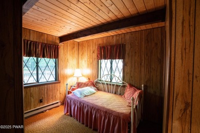 Welcome to this classic Pocono lake chalet, nestled in the heart on The Hideout Golf in Pennsylvania - for sale on GolfHomes.com, golf home, golf lot